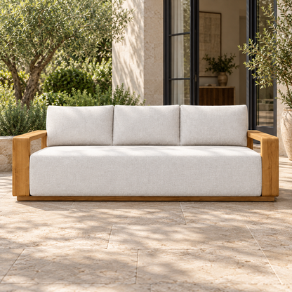 Grace Sofa in Teak, complete front view on a furnished-home terrace