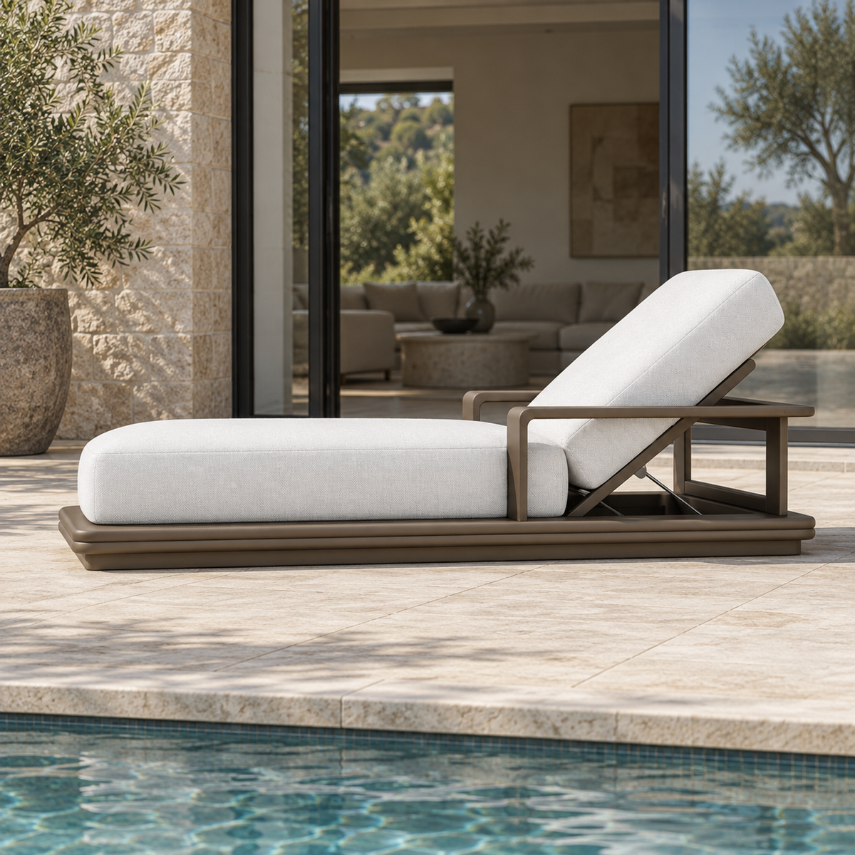 Grace aluminium sun lounger, low right side profile view on a furnished home terrace