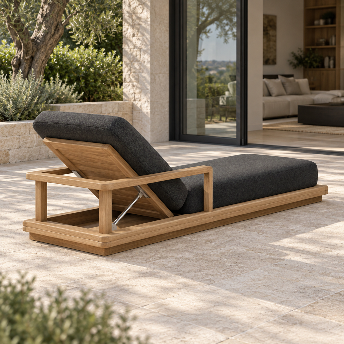 Grace teak sun lounger, rear head-end view beside a furnished living room