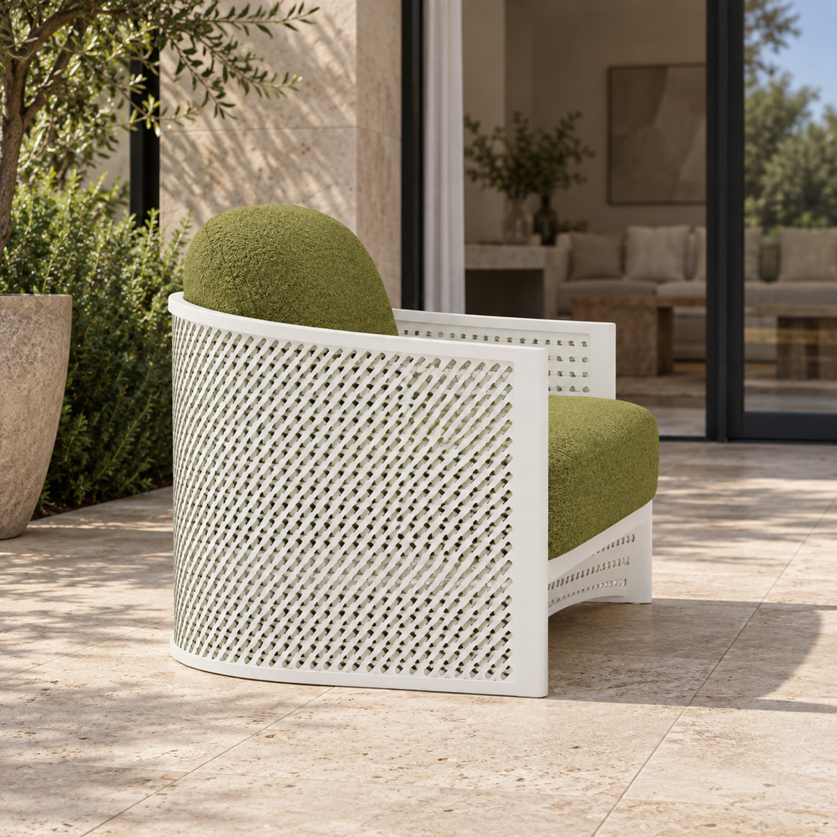 Luna aluminium lounge chair, side view on a stone home terrace