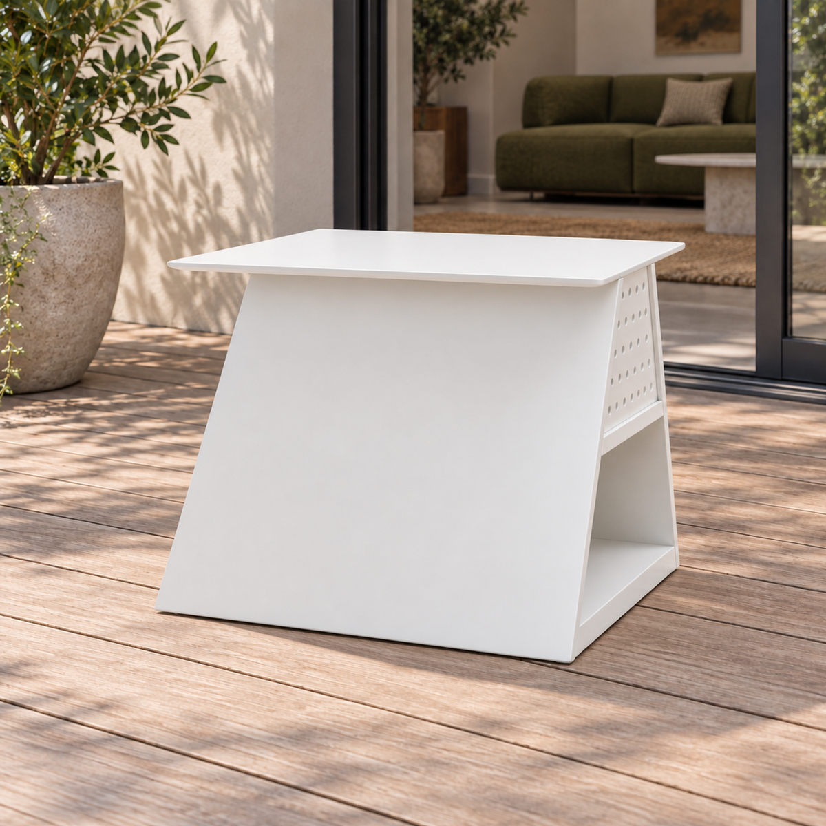Luna occasional table, side view beside a furnished home