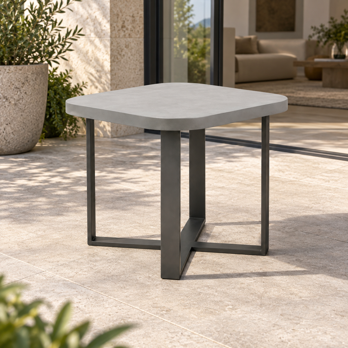 Lifestyle view: Mykonos Side Table, photographed in a quiet outdoor courtyard