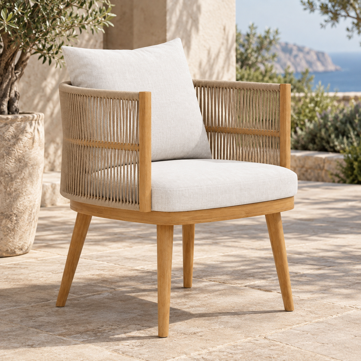Ripple Dining Chair in Teak, complete front-left view on a coastal terrace