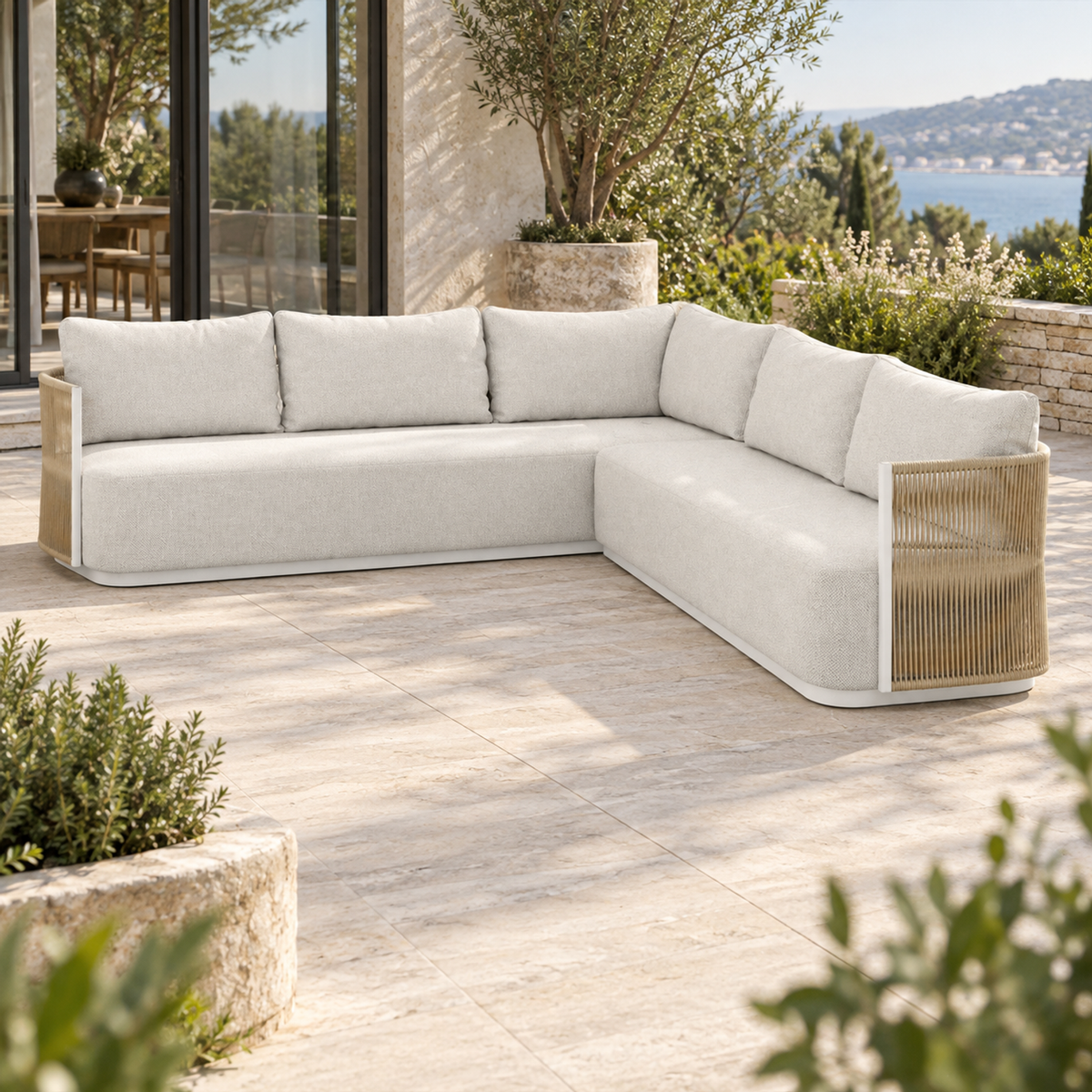 Lifestyle view: Ripple L-Sectional in Aluminium, right-end view on a coastal home terrace