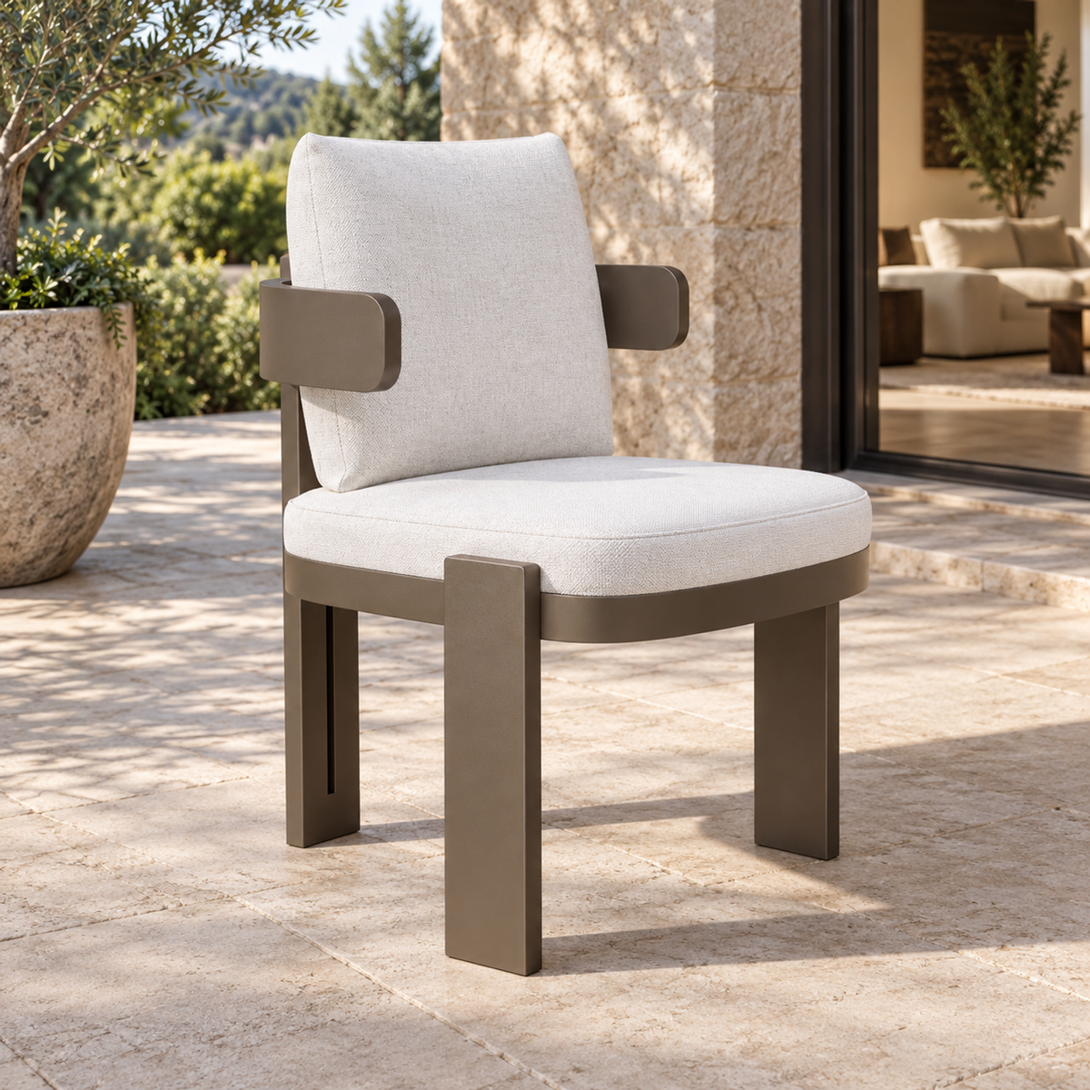 Lifestyle view: Serein aluminium dining chair, left diagonal on a furnished home terrace