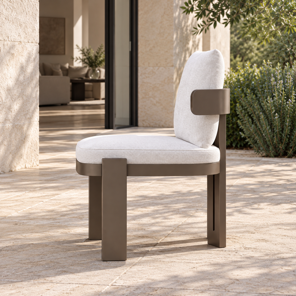Serein Dining Chair in Aluminium, complete left side view beside a furnished home