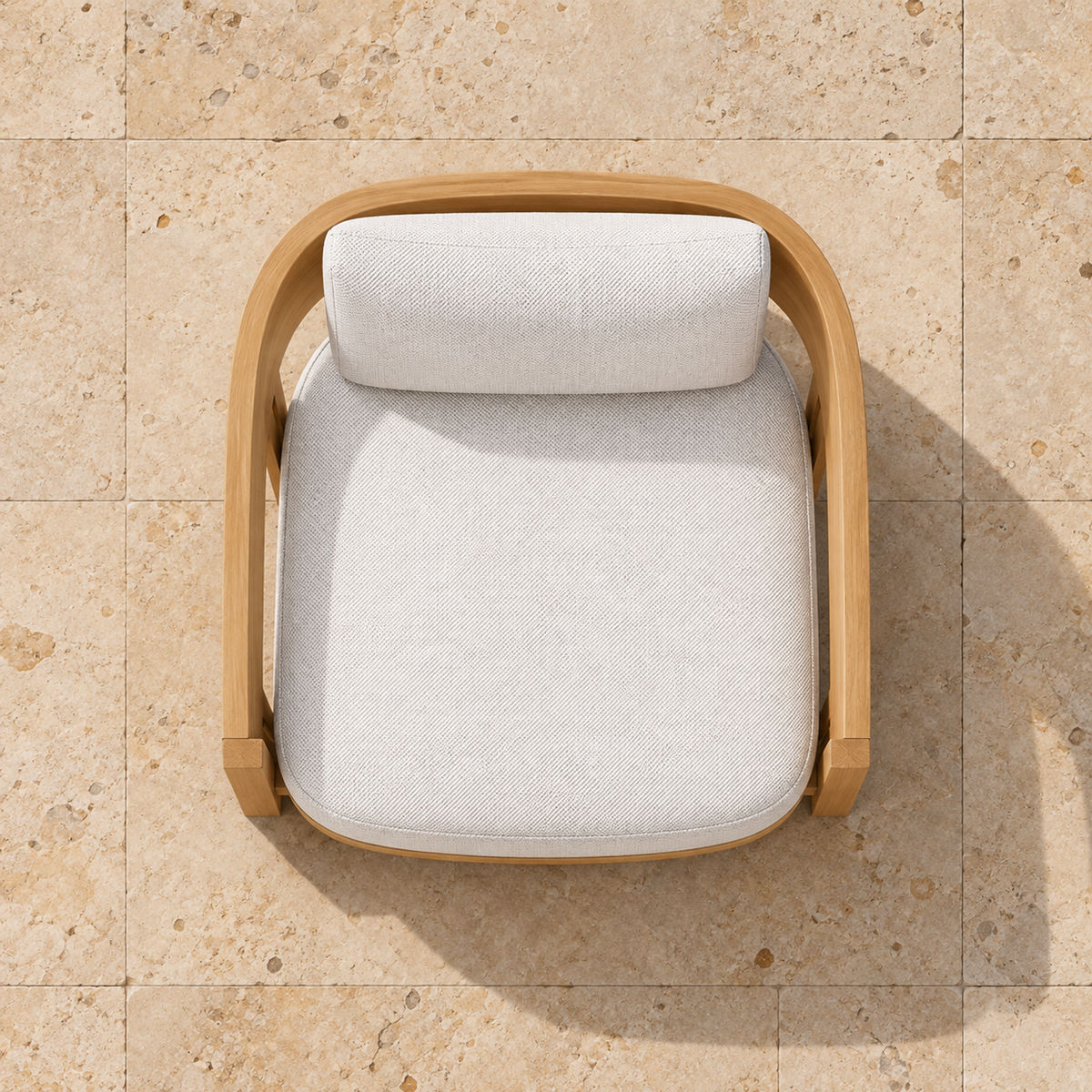 Serein teak lounge chair, overhead view on a stone home terrace