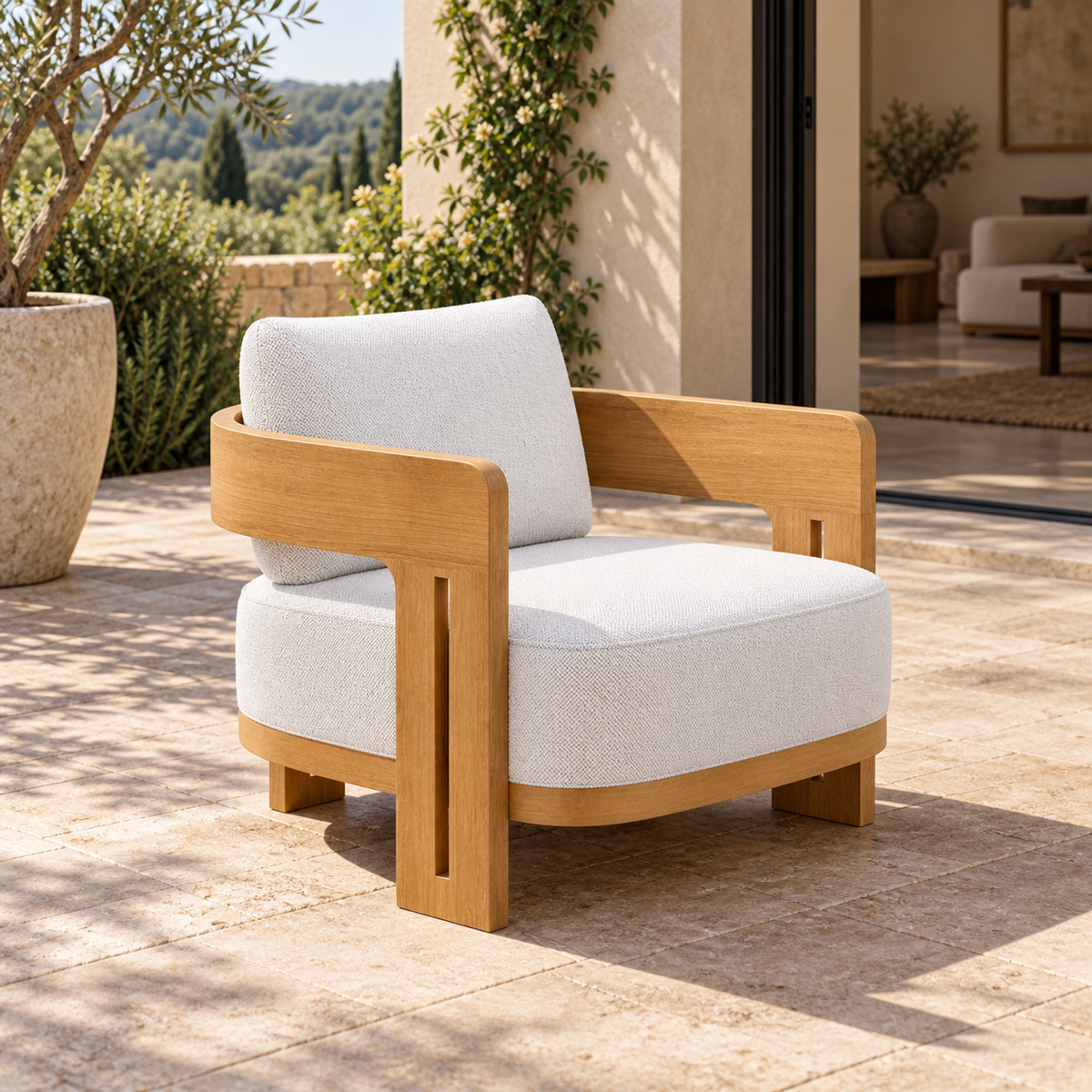 Serein teak lounge chair, left diagonal on a furnished home terrace
