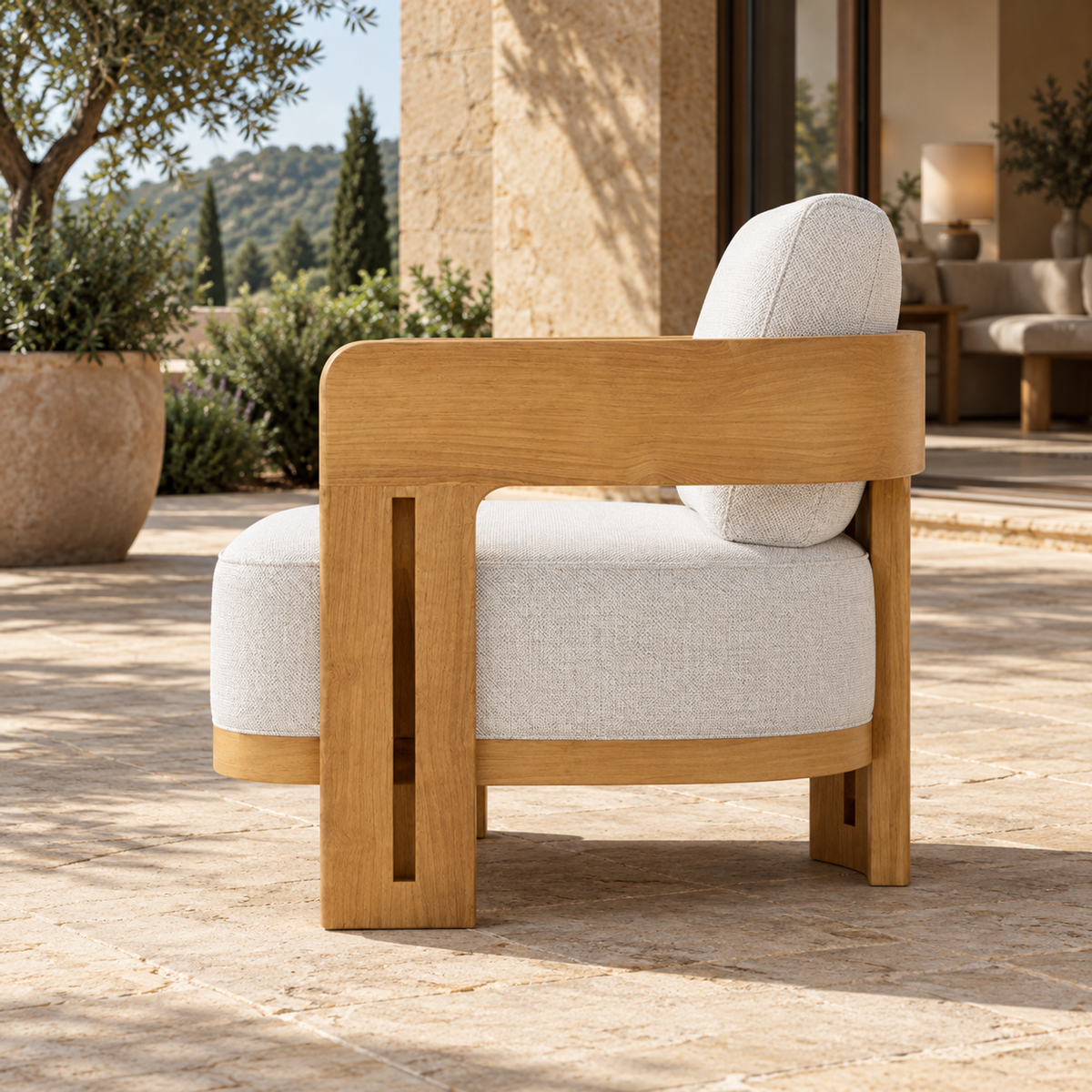 Serein teak lounge chair, side profile on a home terrace