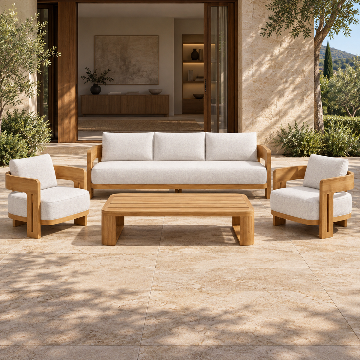 Serein teak sofa, two lounge chairs and coffee table, front view on a furnished home terrace