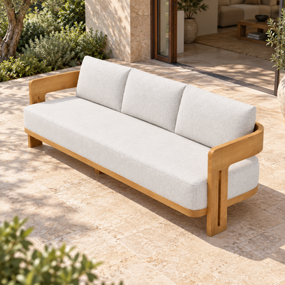Serein teak sofa, elevated right diagonal on a home terrace
