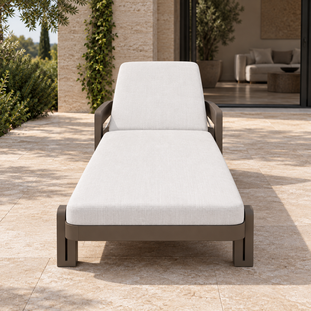 Serein Sun Lounger in Aluminium, centered foot-end view on a home terrace