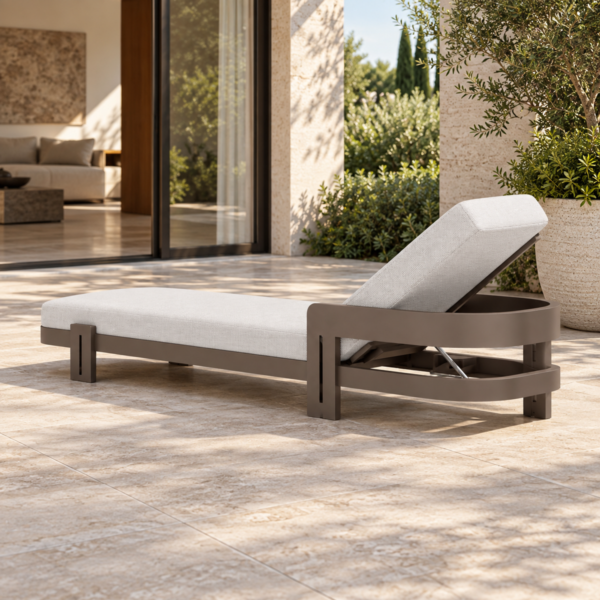 Serein aluminium sun lounger, head-end diagonal beside a furnished home