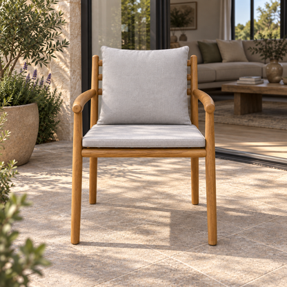 Lifestyle view: Sintra Dining Chair, photographed in a quiet outdoor courtyard