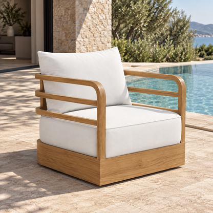 Vela teak lounge chair, diagonal view on a home terrace