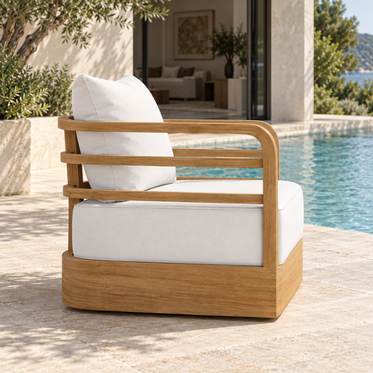 Vela teak lounge chair, side view on a home terrace