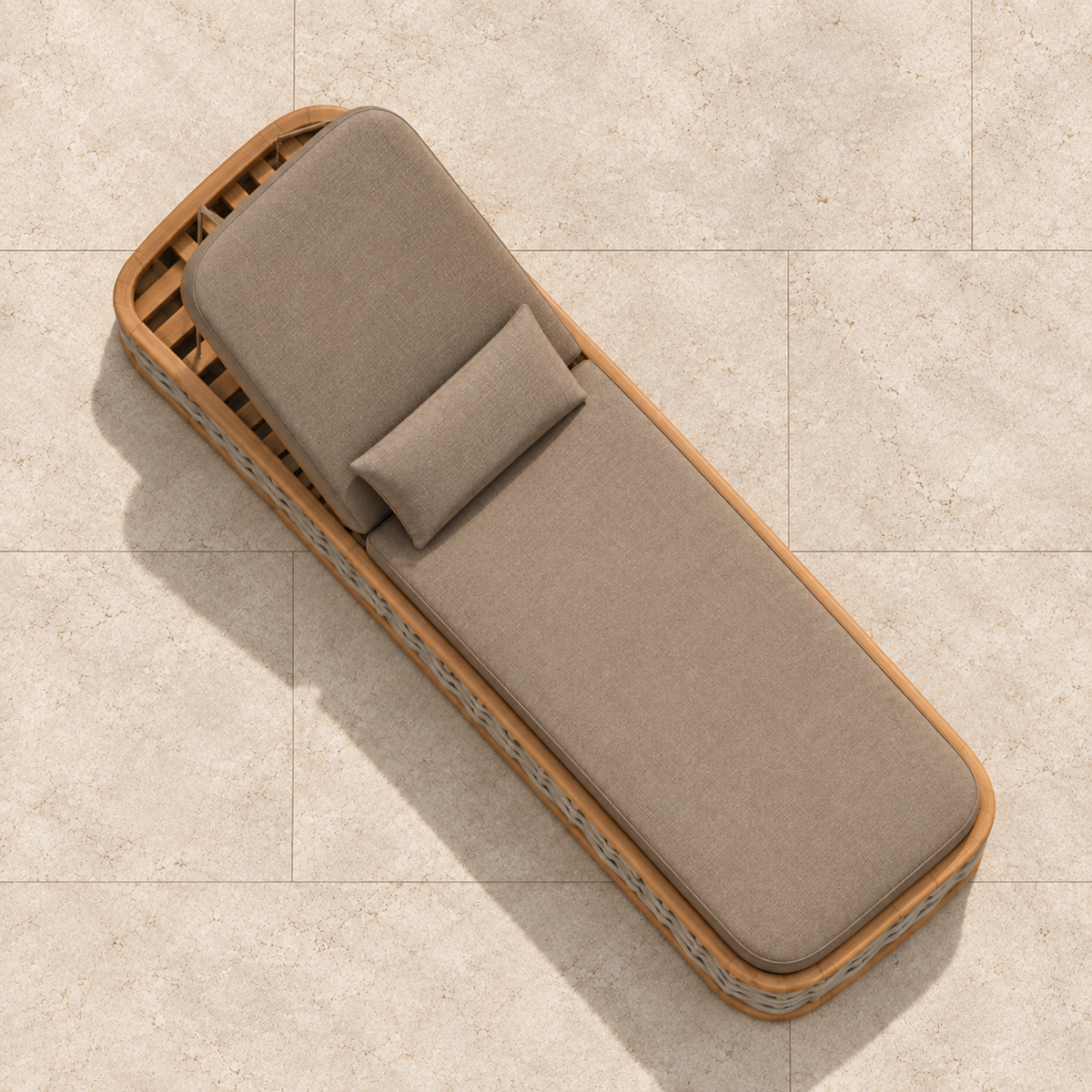 Vela woven teak sun lounger, overhead view on a stone terrace
