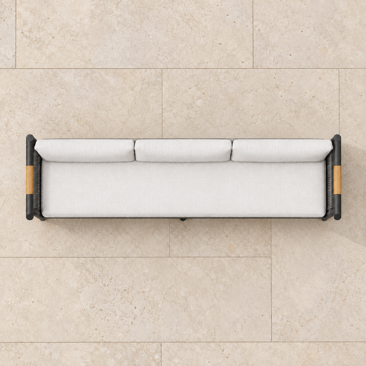 Zenia aluminium sofa, overhead view on a stone home terrace
