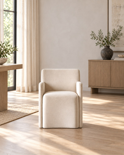 Aurelie Track Arm Fabric Dining Armchair in a styled setting