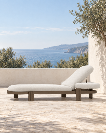 Ethereal Sun Lounger in Aluminium in a styled setting