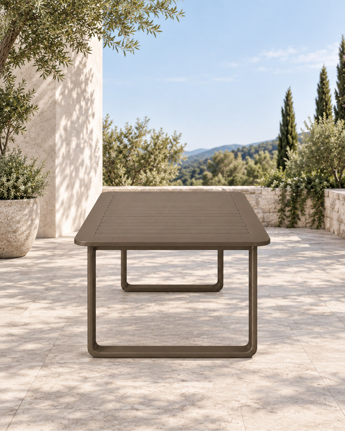 Grace Dining Table in Aluminium in a styled setting