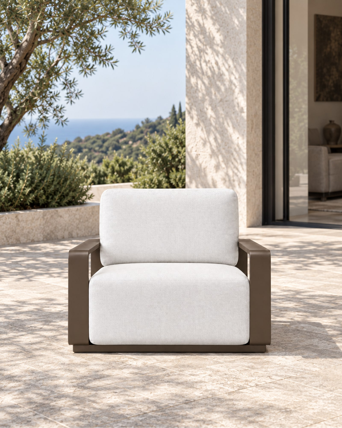 Grace Lounge Chair in Aluminium in a styled setting