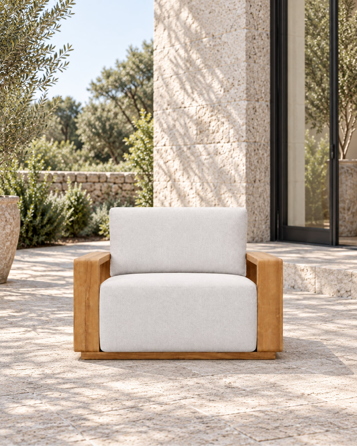 Grace Lounge Chair in Teak in a styled setting