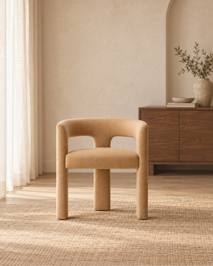Inès Open-Back Fabric Dining Armchair in a styled setting