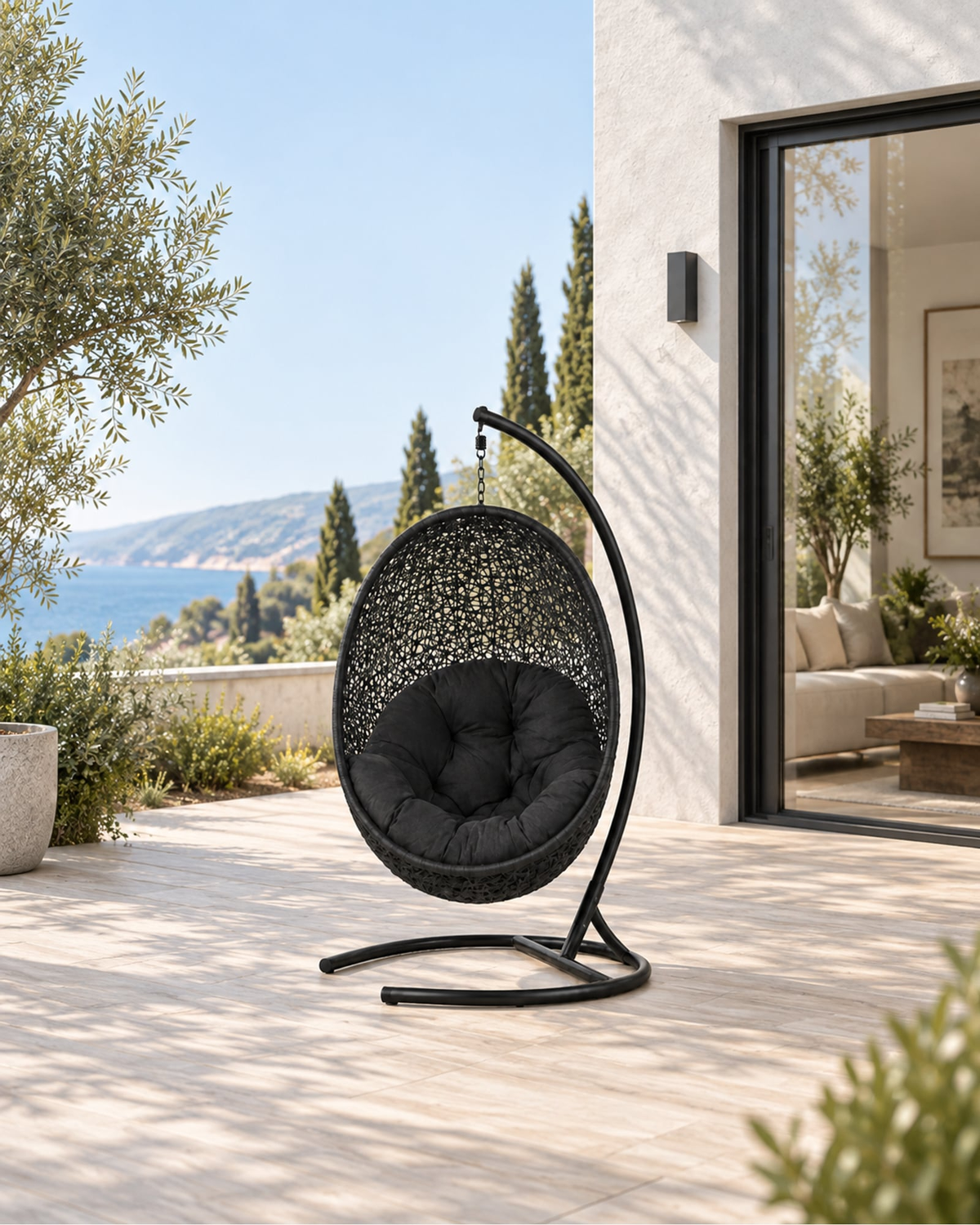 Nido Hanging Chair with Stand in a styled setting