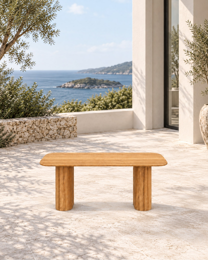 Ripple Dining Table in Teak in a styled setting