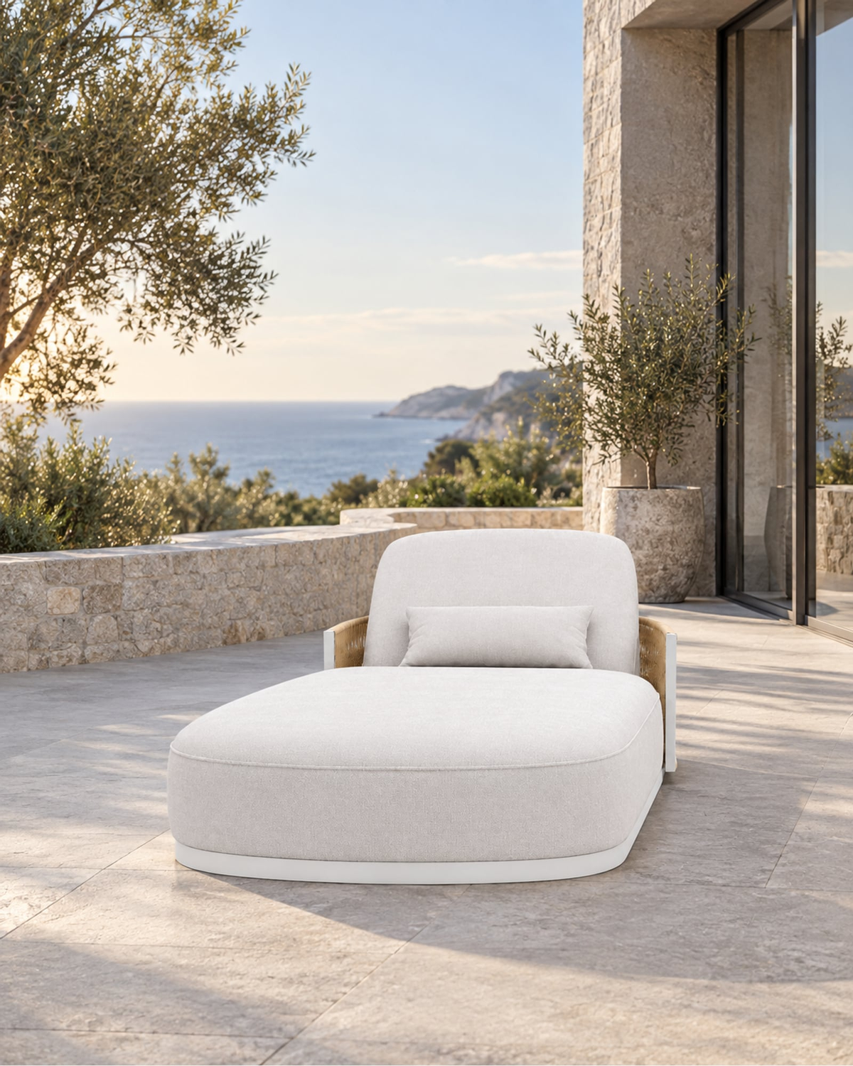 Ripple Flat Sun Lounger in Aluminium in a styled setting