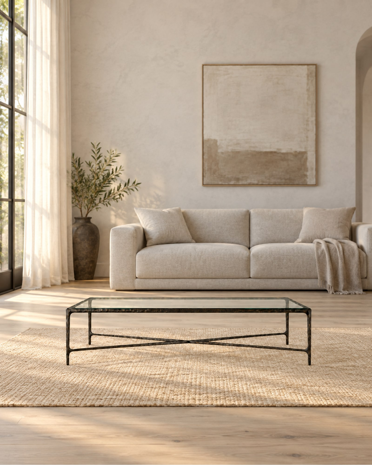 Thaddeus Glass Coffee Table in a styled setting