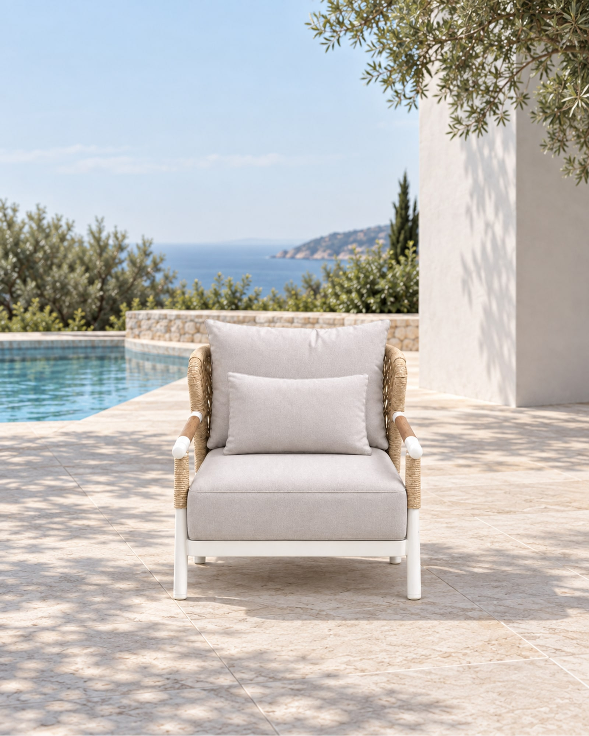 Vela Lounge Chair in Aluminium in a styled setting